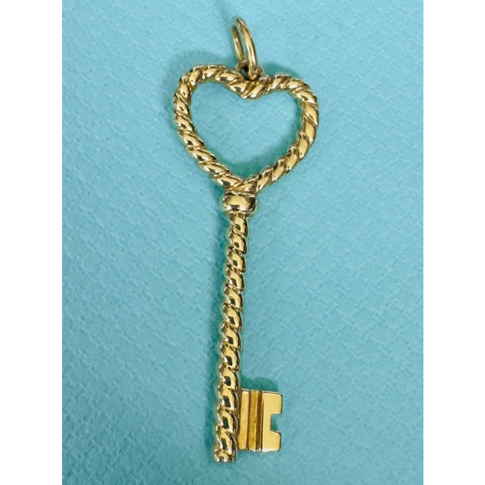 Tiffany & Co. 18k Gold Twisted Heart Key Pendant/Charm